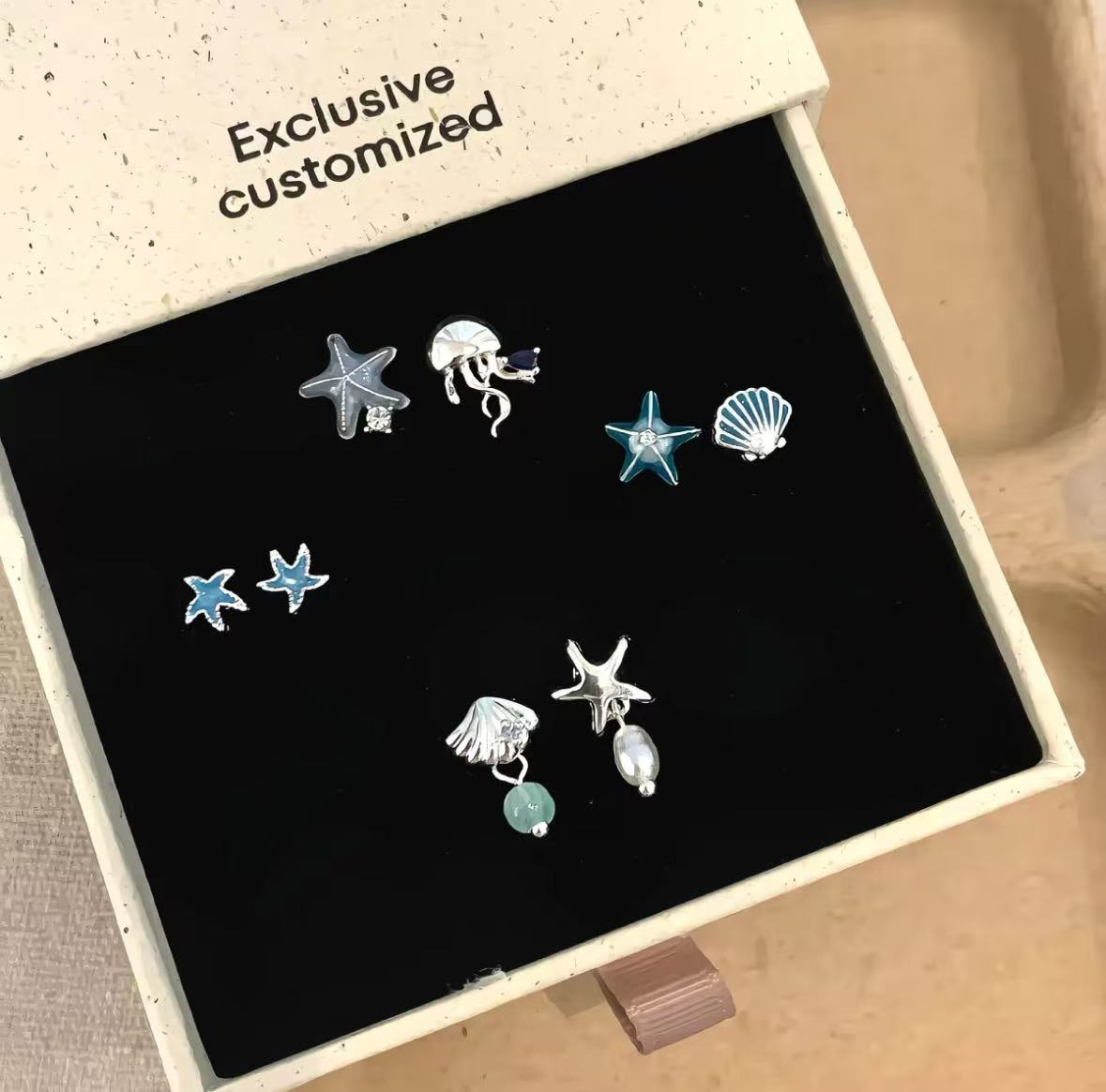 Starfish shell asymmetrical stud earrings for women